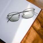 eyeglasses on an open stationery